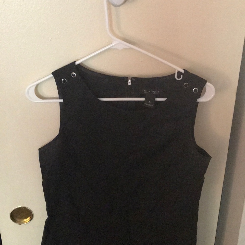 Black sleeveless dress with front zip pockets